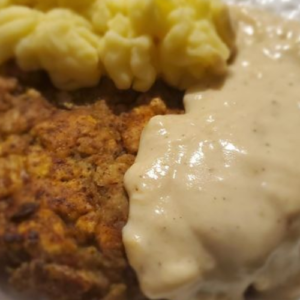 CHICKEN FRIED CHICKEN WITH ONIONS & BUTTERMILK GRAVY