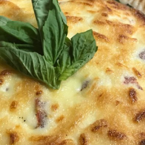 SAVORY TOMATO, FETA, AND BASIL PIE