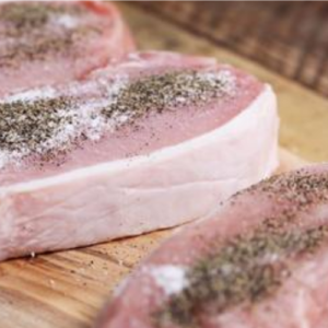 Season pork chops and then toss in slow cooker. 4 ingredients later, dinner will come out divine