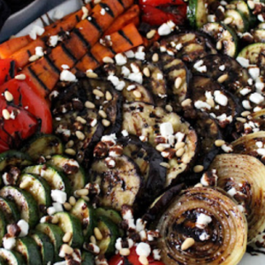 Enjoy a delicious combination of grilled vegetables, creamy goat cheese, and tangy balsamic glaze in this dish. Perfectly cooked and seasoned, these veggies are sure to satisfy your taste buds.