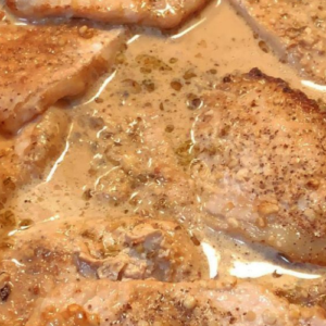 SOUTHERN SMOTHERED PORK CHOPS: AN INCREDIBLE AND TENDER DELIGHT