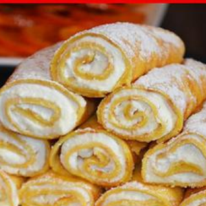 Thin pancakes with cheese in delicate milk sauce. A truly decadent dessert!